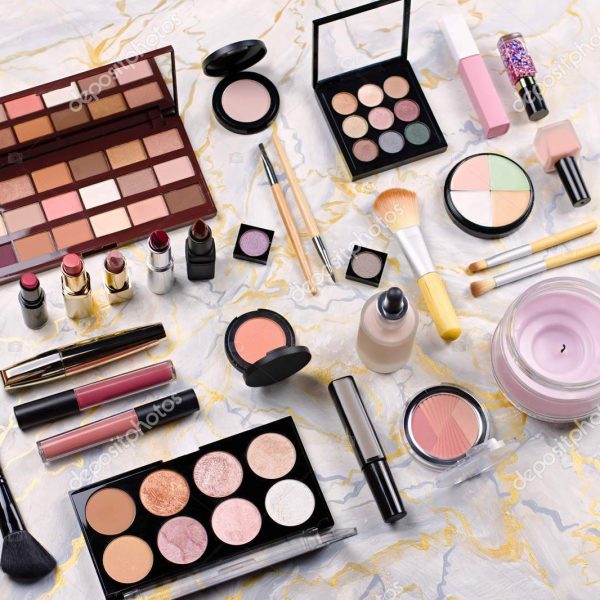 Various makeup products on table, flat design. Woman cosmetic essentials